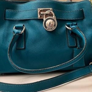 Turquoise Micheal Kors handbag